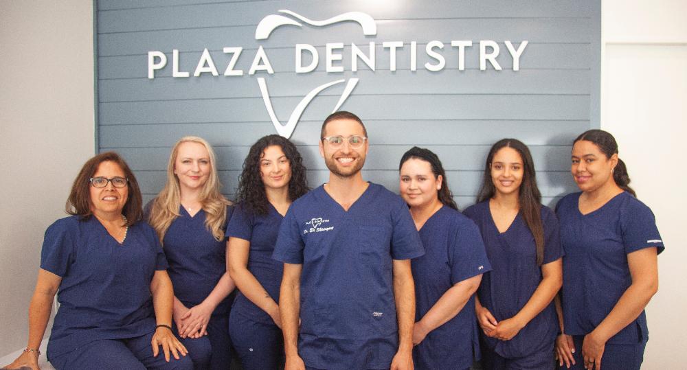 group photo of plaza dentistry team | invisalign teaneck new jersey