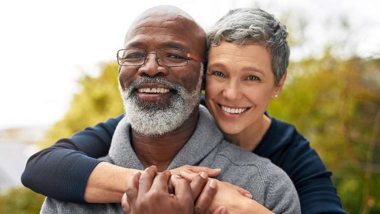 older couple smiling | dentures teaneck nj